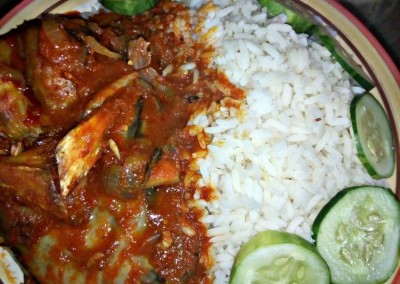 Whole catfish with rice and vegetables